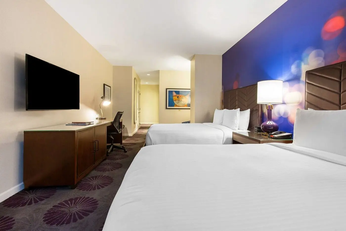 Spacious Chicago hotel room with two beds for group accommodations