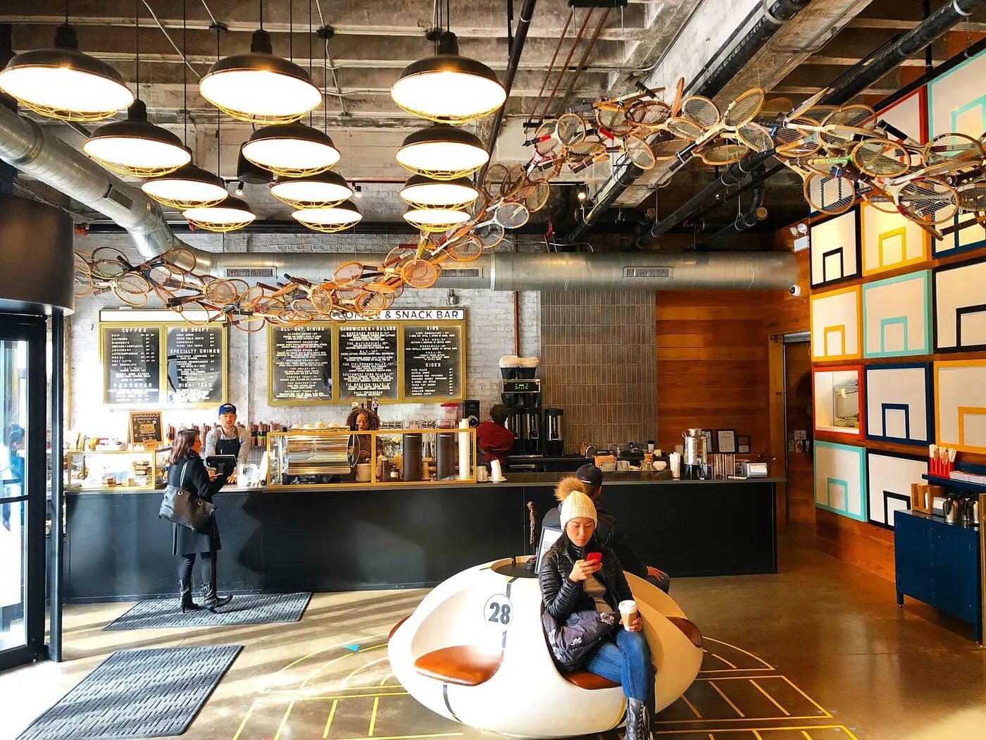 The Chicago Hotel Collection River North lobby with sports-themed décor