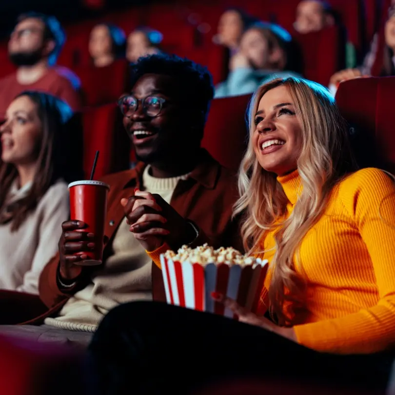 Friends enjoying a movie together